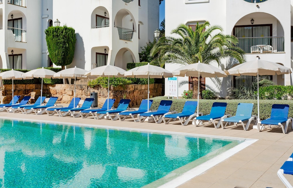 Flipflop Surfing Playa Apartments — Swimming pool in Santa Ponca, Balearic Islands