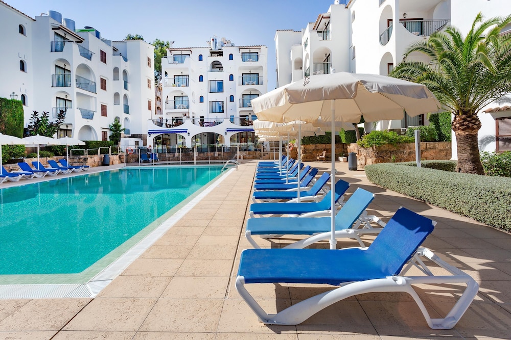 Flipflop Surfing Playa Apartments — Swimming pool in Santa Ponca, Balearic Islands