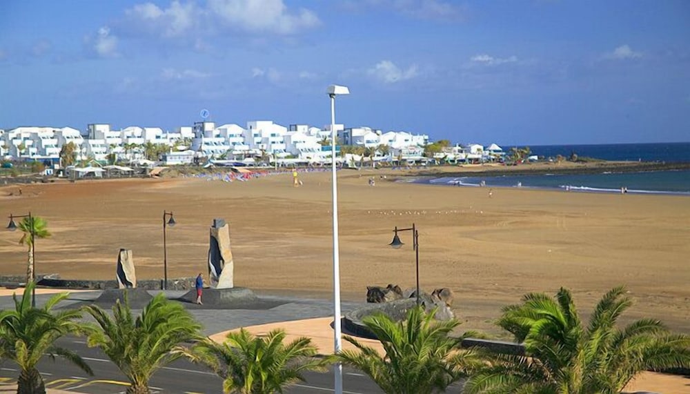 Apartamentos Club Pocillos — Beach in Puerto del Carmen, Canary Islands