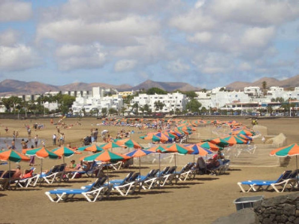 Apartamentos Club Pocillos — Beach in Puerto del Carmen, Canary Islands