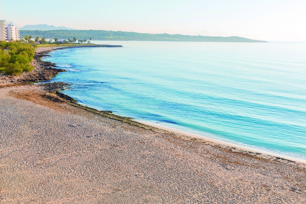 Hotel Club S'illot — Beach in S'Illot, Balearic Islands