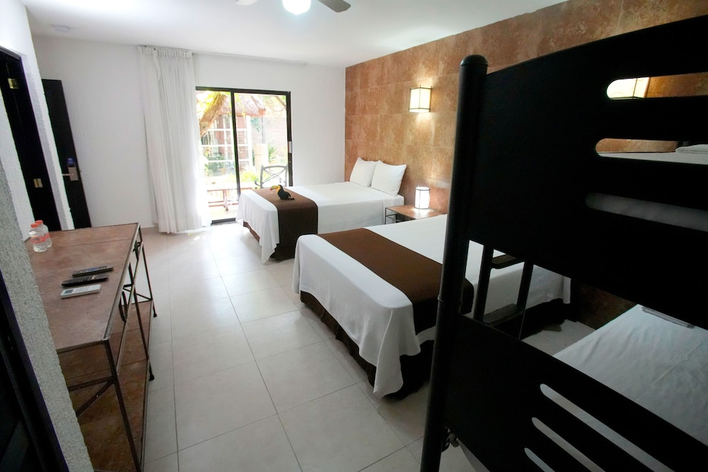 Tukan Hotel Playa del Carmen — Hotel rooms in Playa del Carmen, Quintana Roo
