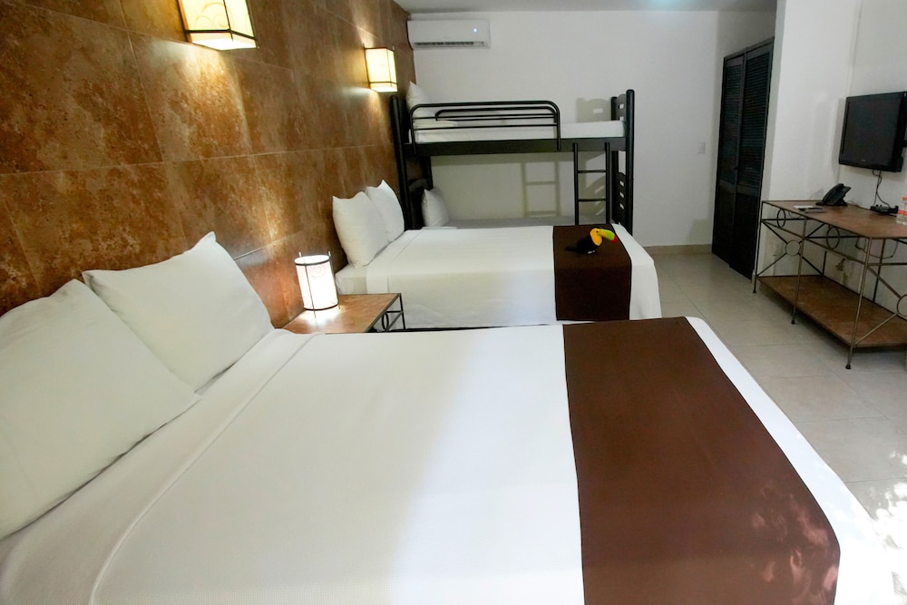 Tukan Hotel Playa del Carmen — Hotel rooms in Playa del Carmen, Quintana Roo