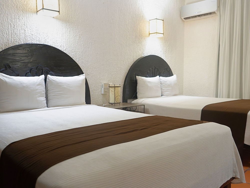 Tukan Hotel Playa del Carmen — Hotel rooms in Playa del Carmen, Quintana Roo