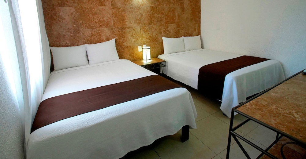 Tukan Hotel Playa del Carmen — Hotel rooms in Playa del Carmen, Quintana Roo