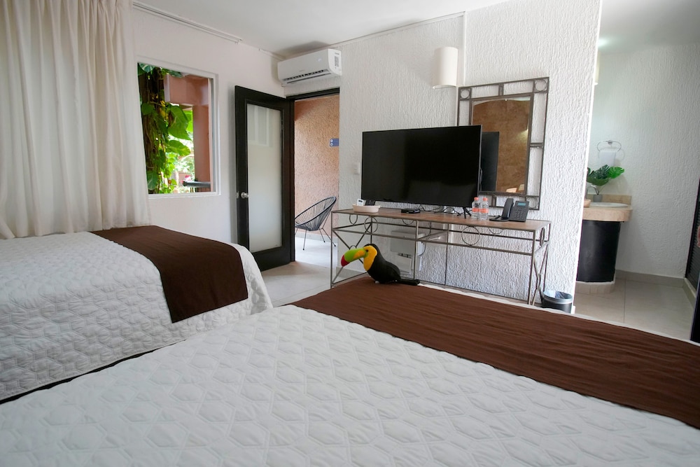 Tukan Hotel Playa del Carmen — Hotel rooms in Playa del Carmen, Quintana Roo