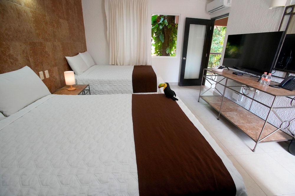 Tukan Hotel Playa del Carmen — Hotel rooms in Playa del Carmen, Quintana Roo