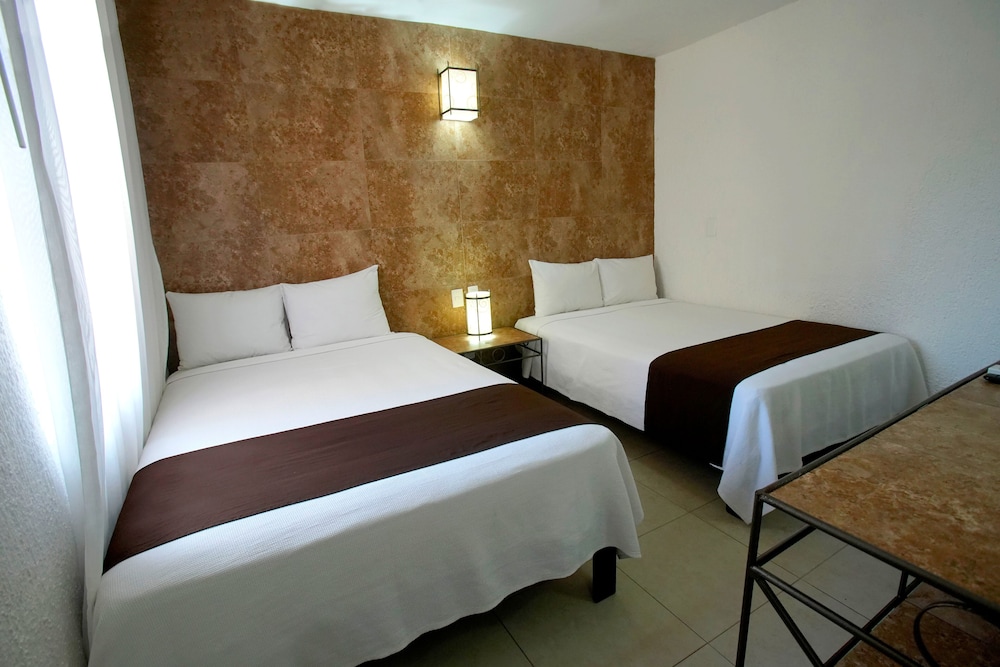 Tukan Hotel Playa del Carmen — Hotel rooms in Playa del Carmen, Quintana Roo