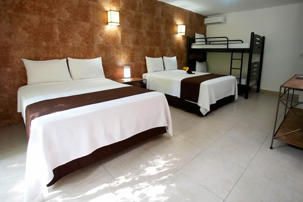 Tukan Hotel Playa del Carmen — Hotel rooms in Playa del Carmen, Quintana Roo