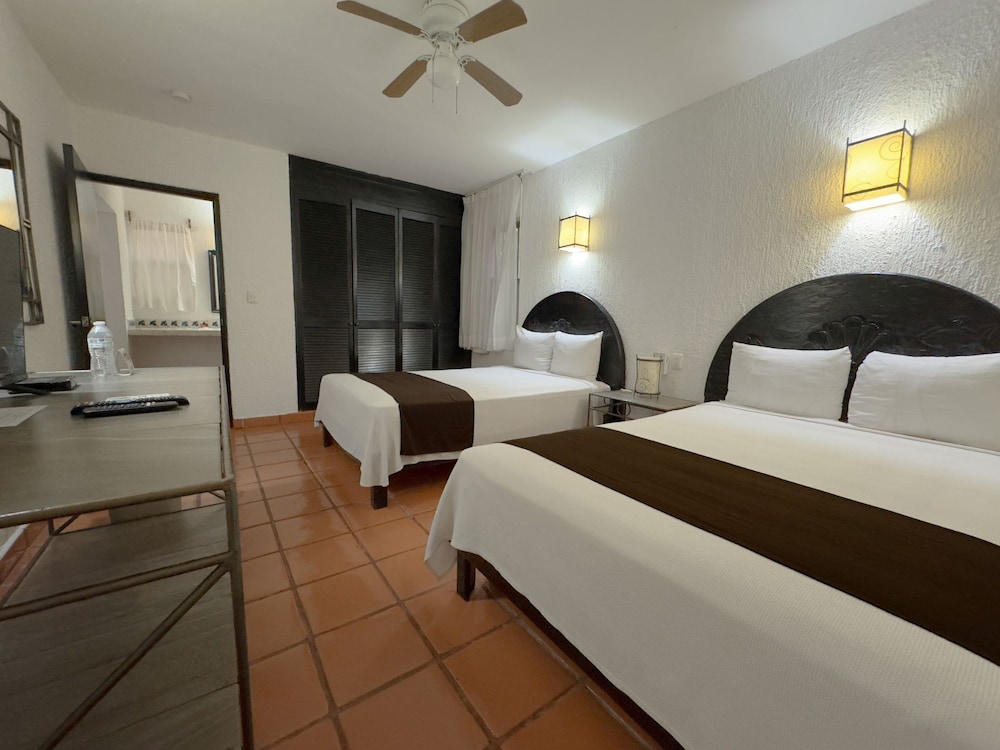 Tukan Hotel Playa del Carmen — Hotel rooms in Playa del Carmen, Quintana Roo