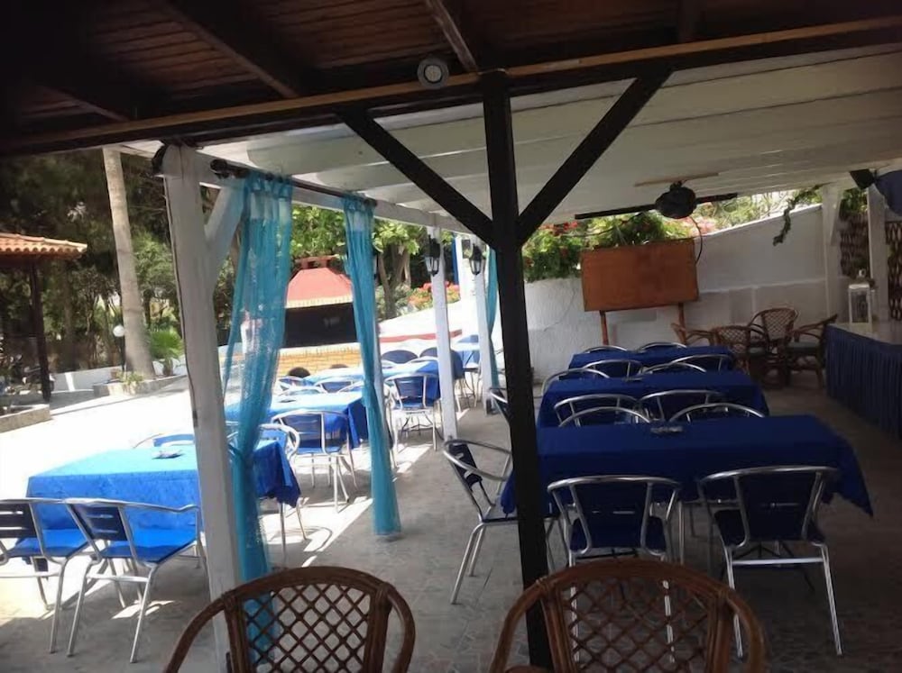 Aspro Spiti — Restaurant & bars in Tigaki, South Aegean