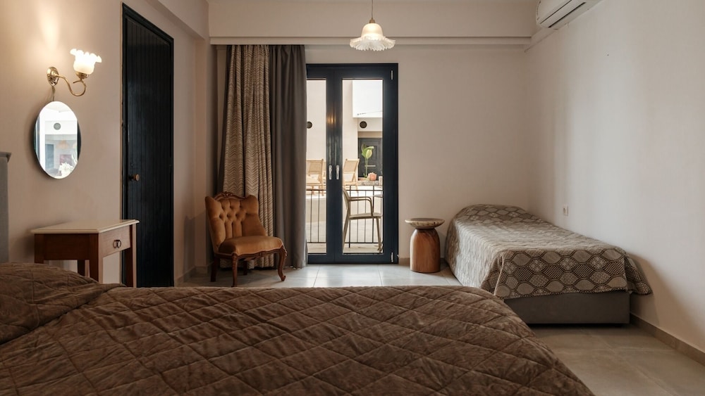Nami Hotel & Suites — Hotel rooms in Stalida
