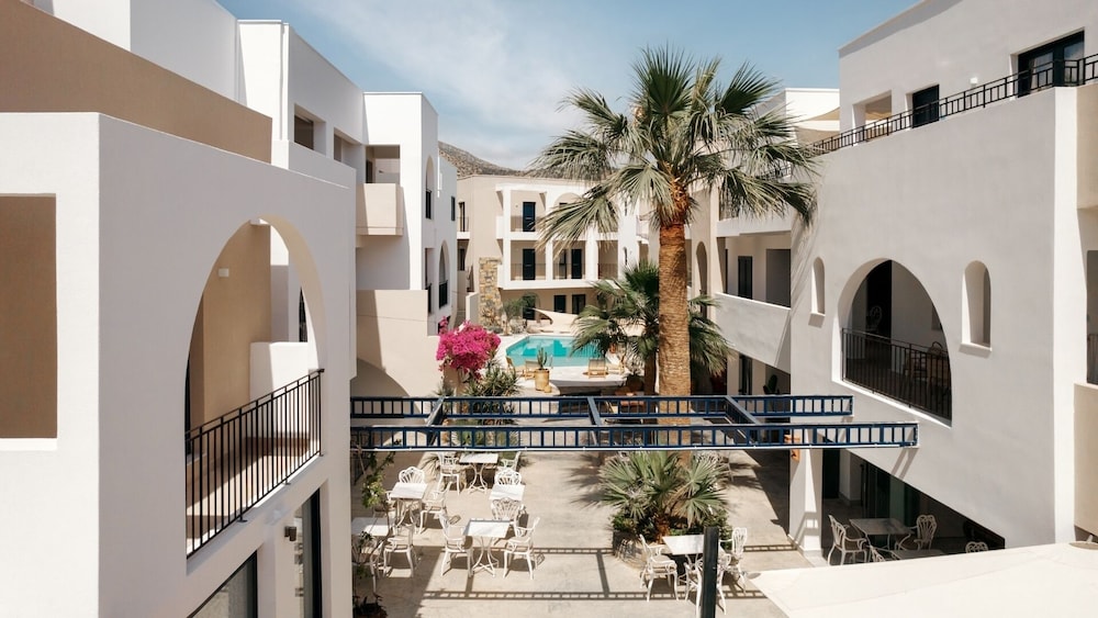 Nami Hotel & Suites — Hotel building in Stalida