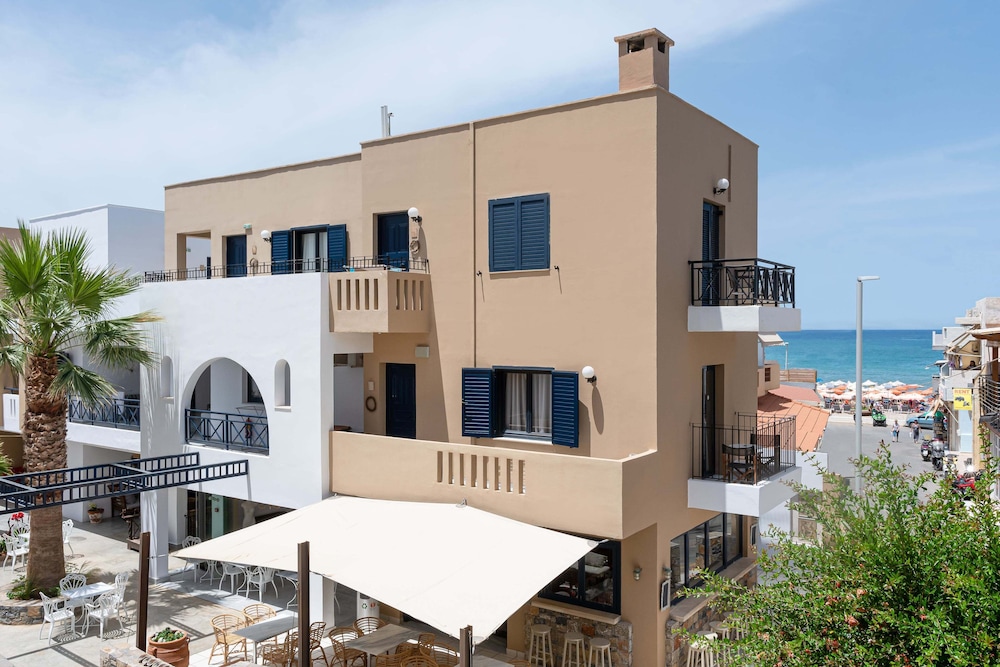Nami Hotel & Suites — Hotel building in Stalida