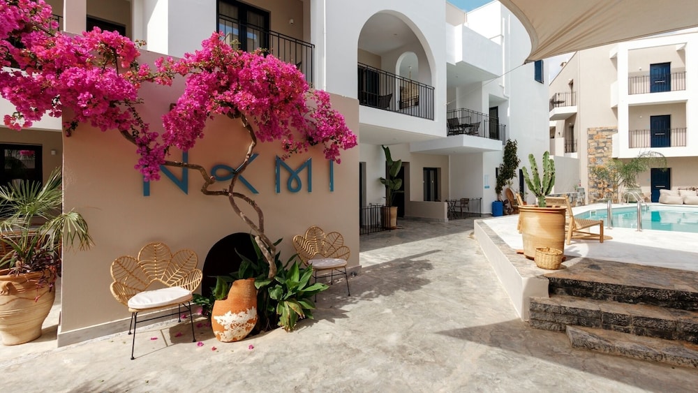 Nami Hotel & Suites — Hotel building in Stalida