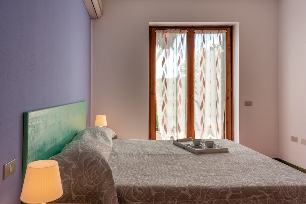 Residence Le Pavoncelle — Hotel rooms in Capo Testa, Sardinia