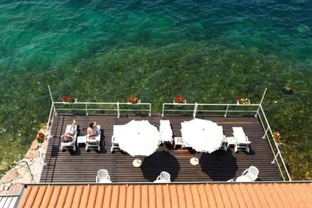Hotel Vega — Beach in Malcesine, Veneto
