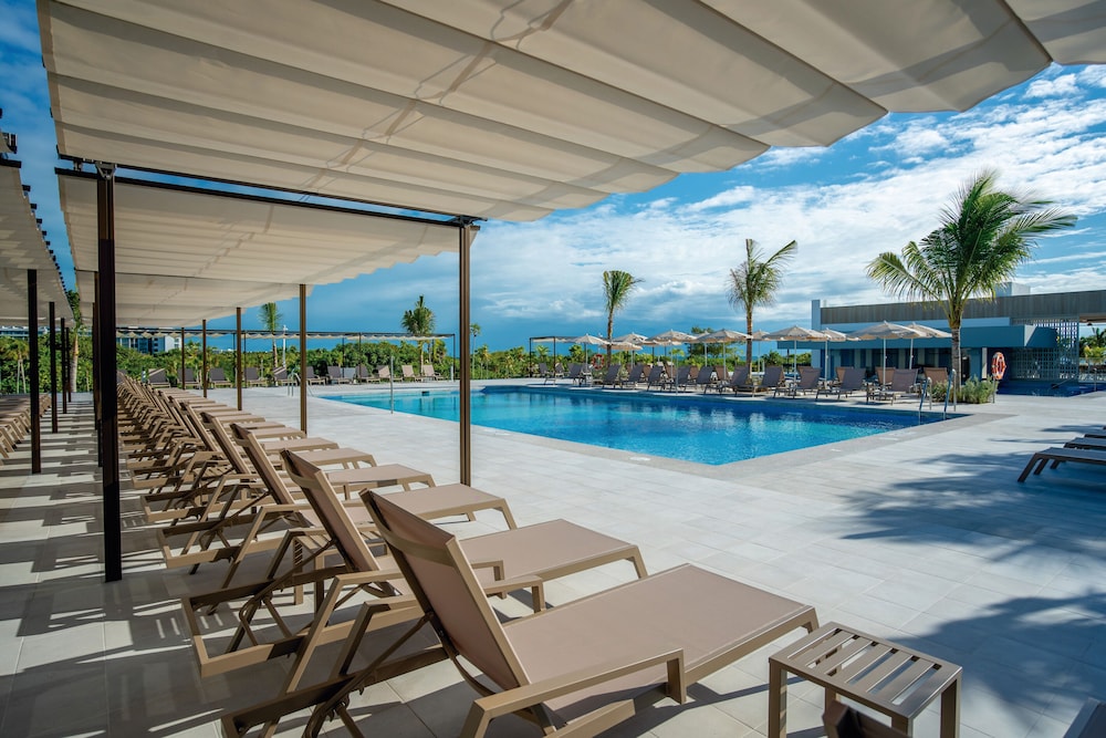 Hotel Riu Latino - Adults Only - All Inclusive — Swimming pool in Playa Mujeres, Quintana Roo