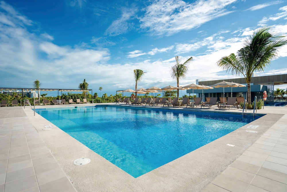 Hotel Riu Latino - Adults Only - All Inclusive — Swimming pool in Playa Mujeres, Quintana Roo