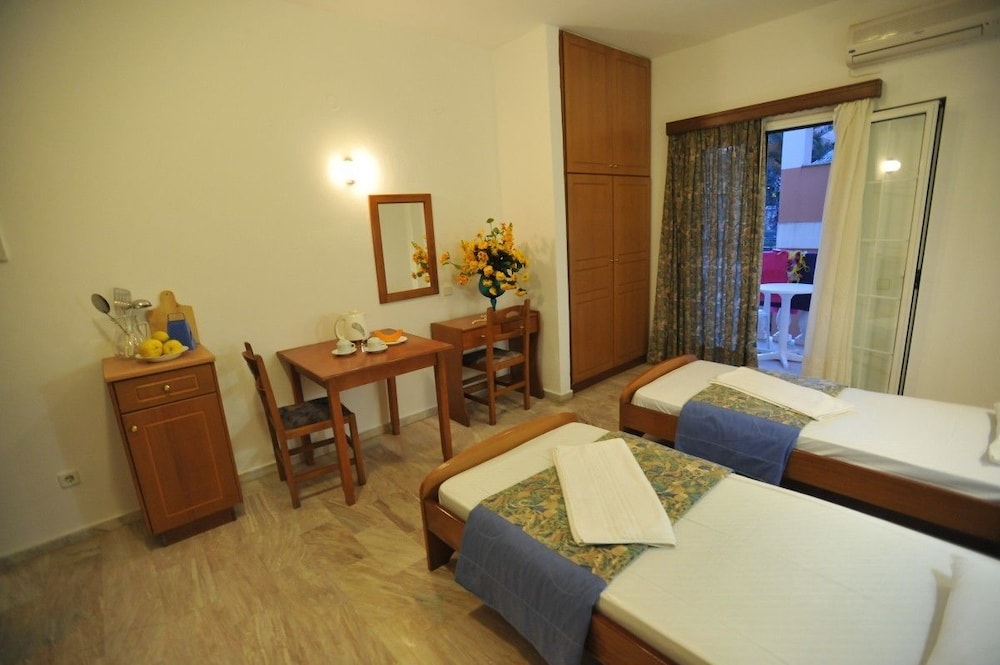 Saint Spiridon Hotel — Hotel rooms in Kassopei, Ionian Islands