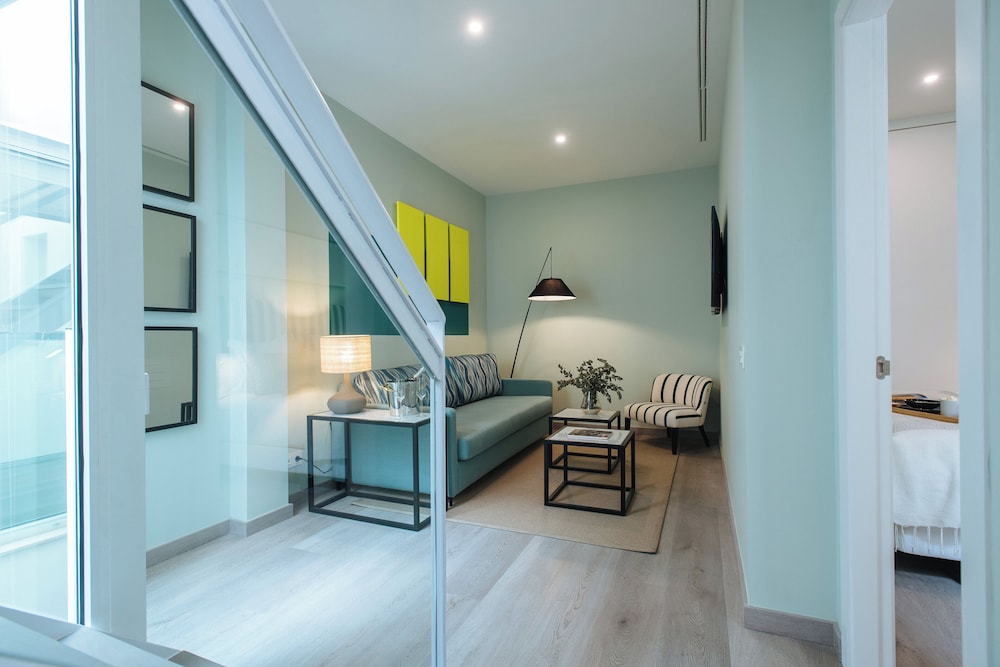 Sercotel Sevilla Guadalquivir Suites — Hotel rooms in Seville, Andalusia