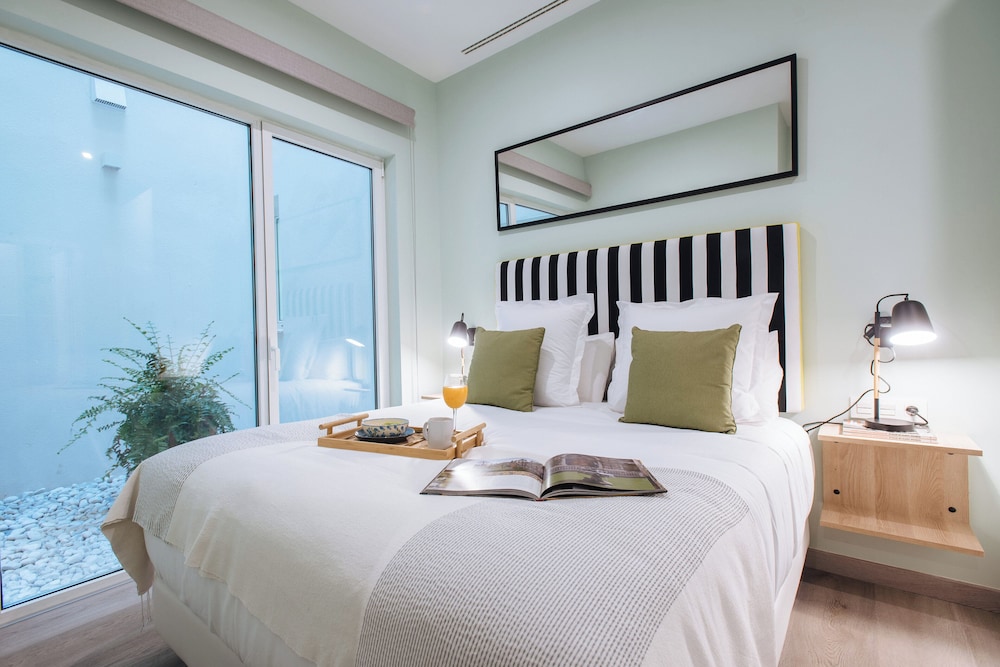Sercotel Sevilla Guadalquivir Suites — Hotel rooms in Seville, Andalusia