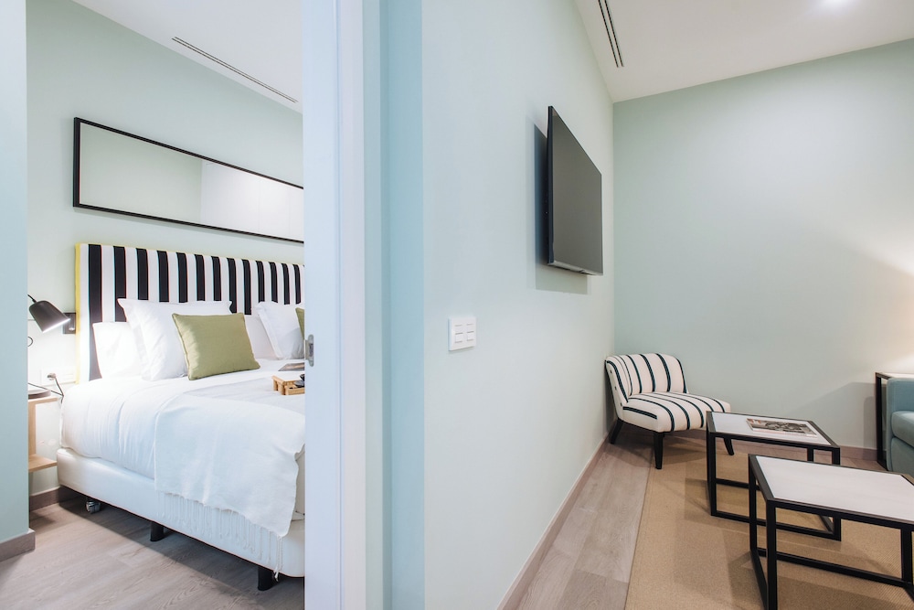 Sercotel Sevilla Guadalquivir Suites — Hotel rooms in Seville, Andalusia