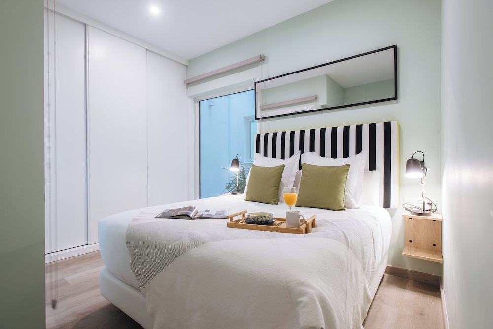 Sercotel Sevilla Guadalquivir Suites — Hotel rooms in Seville, Andalusia