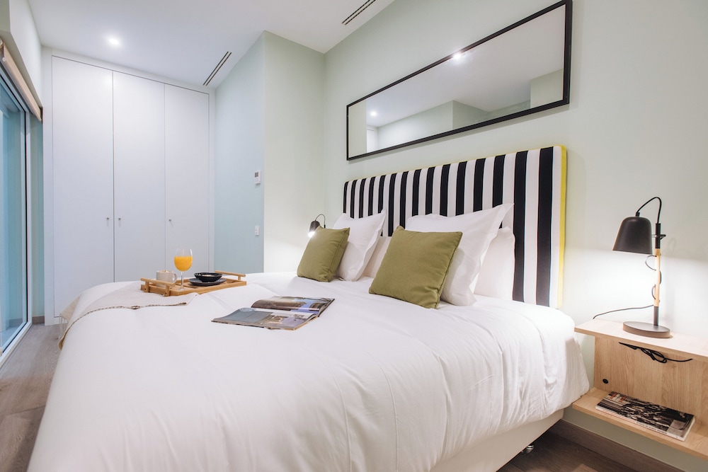 Sercotel Sevilla Guadalquivir Suites — Hotel rooms in Seville, Andalusia