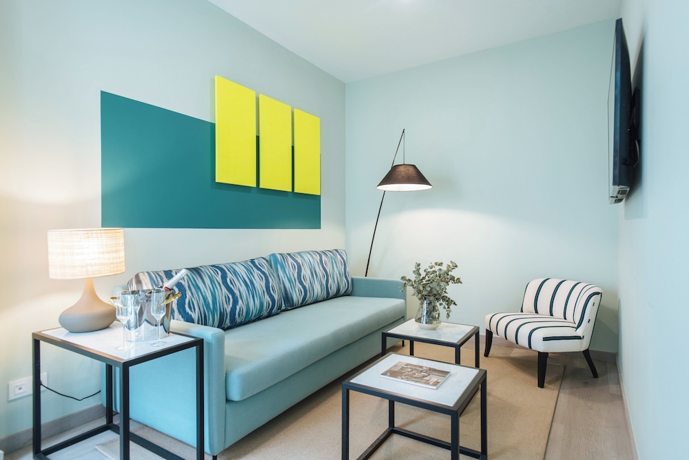 Sercotel Sevilla Guadalquivir Suites — Hotel rooms in Seville, Andalusia