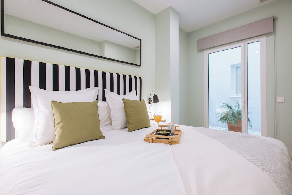 Sercotel Sevilla Guadalquivir Suites — Hotel rooms in Seville, Andalusia