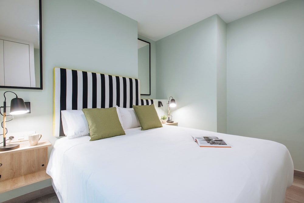 Sercotel Sevilla Guadalquivir Suites — Hotel rooms in Seville, Andalusia