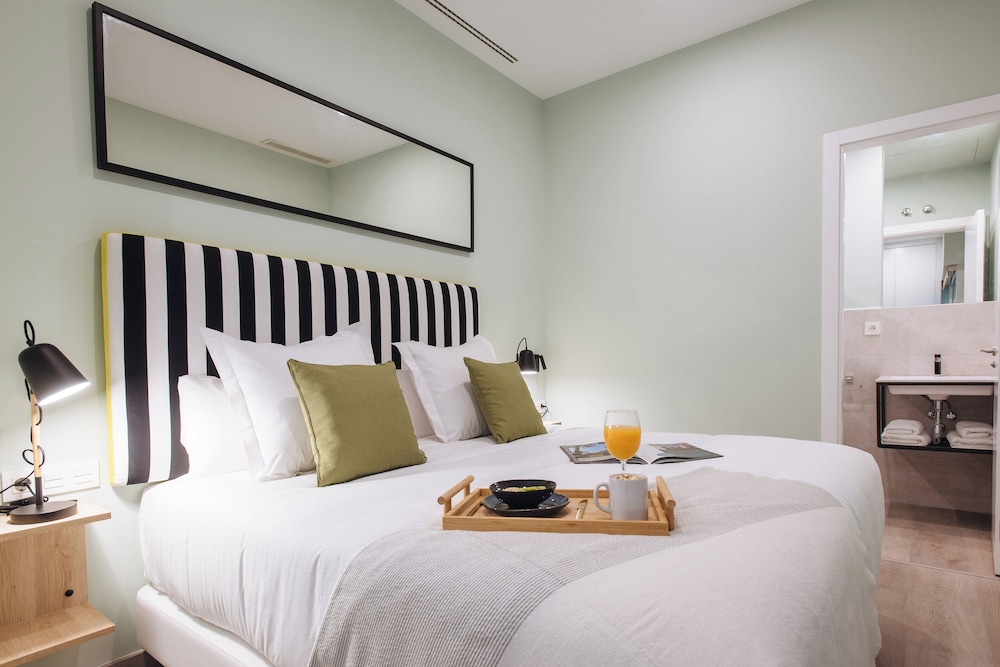 Sercotel Sevilla Guadalquivir Suites — Hotel rooms in Seville, Andalusia