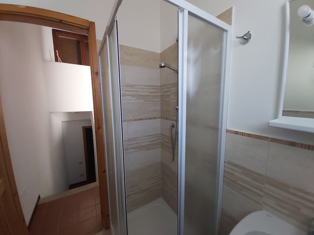 Residence Baia Santa Reparata — Hotel rooms in Capo Testa, Sardinia