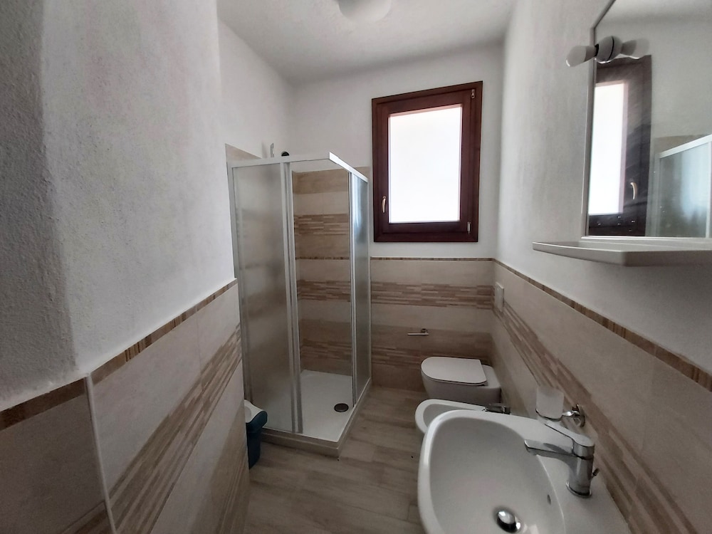 Residence Baia Santa Reparata — Hotel rooms in Capo Testa, Sardinia