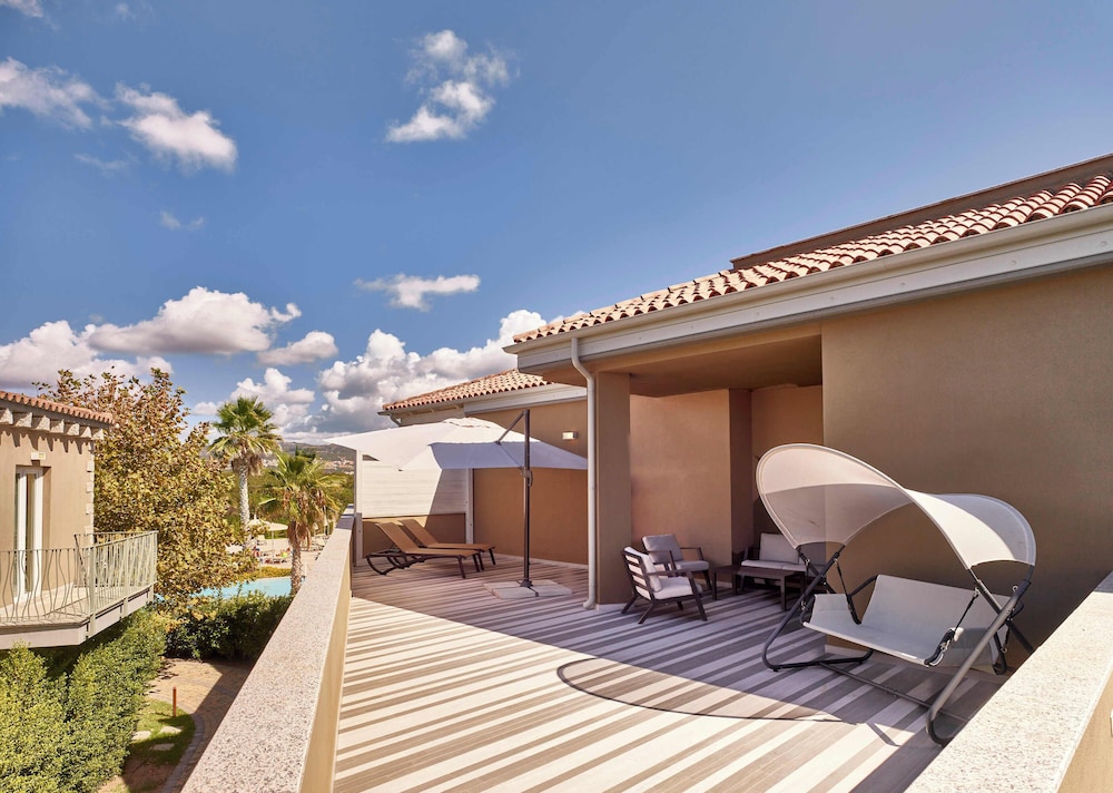 Is Serenas Badesi Resort — Hotel building in Badesi, Sardinia