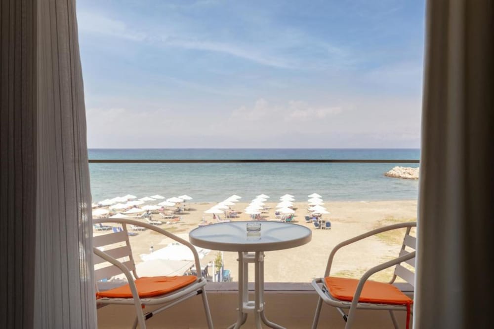 Aqua Luxury Suites Roda — Beach in Roda, Ionian Islands