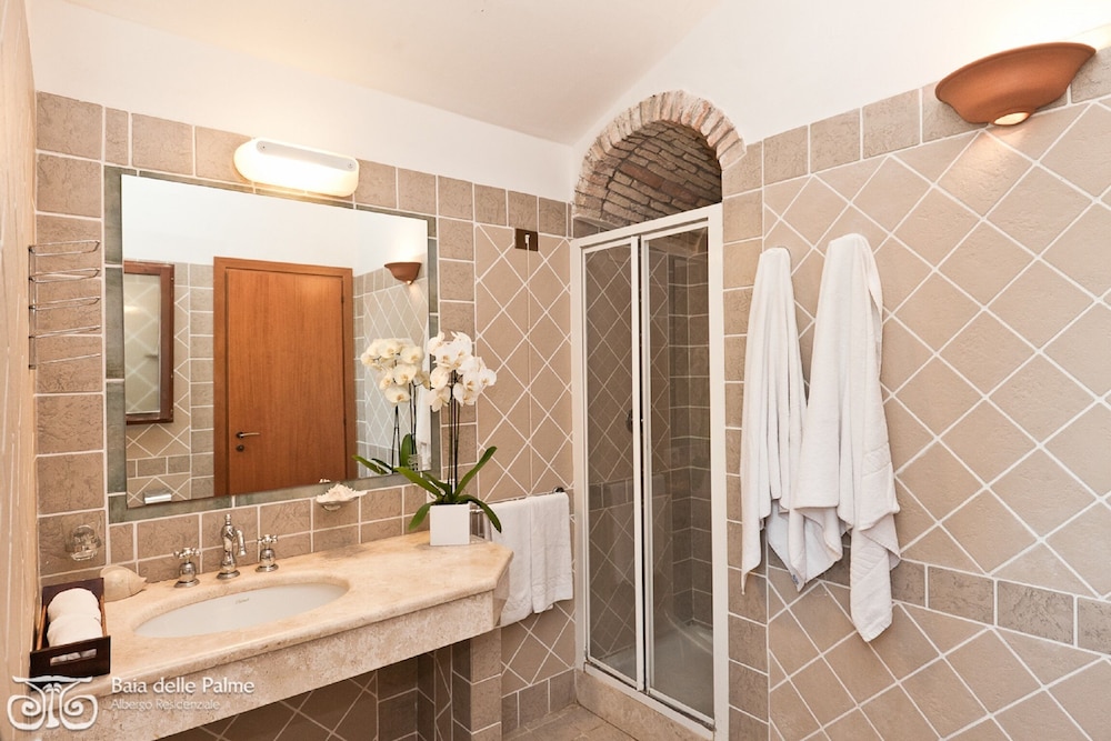 Residence Baia delle Palme — Hotel rooms in Santa Margherita di Pula, Sardinia