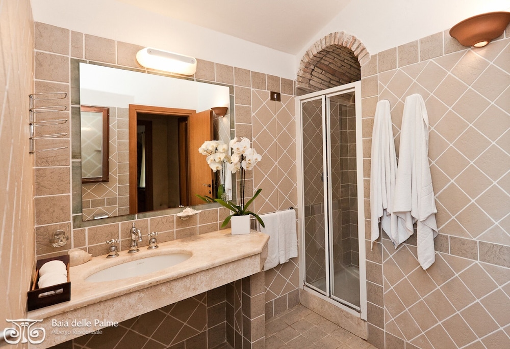 Residence Baia delle Palme — Hotel rooms in Santa Margherita di Pula, Sardinia