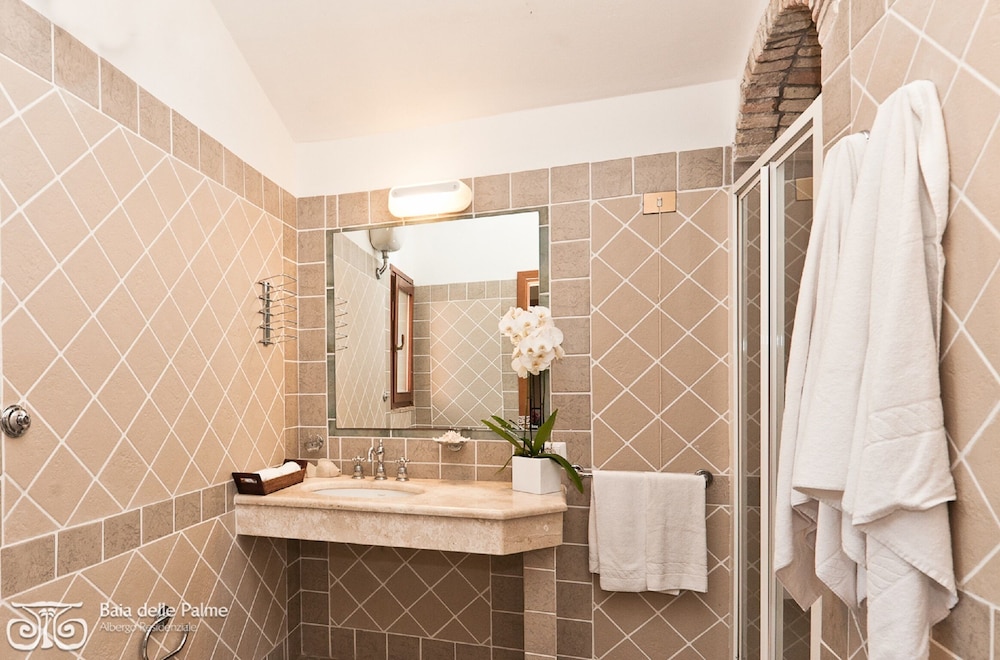 Residence Baia delle Palme — Hotel rooms in Santa Margherita di Pula, Sardinia