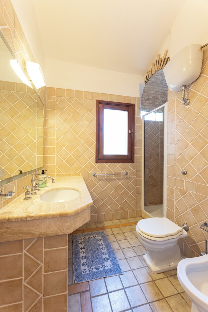Residence Baia delle Palme — Hotel rooms in Santa Margherita di Pula, Sardinia