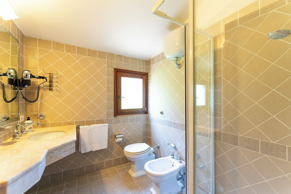 Residence Baia delle Palme — Hotel rooms in Santa Margherita di Pula, Sardinia