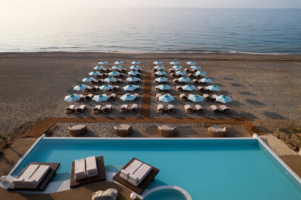 Uzenie All Suites Boutique Resort - Adults Only — Beach in Rethymnon