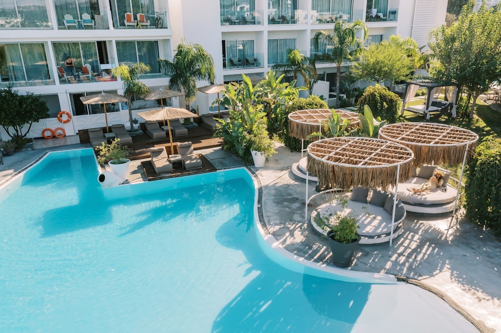 Kouros Exclusive Suites - Adults Only — Swimming pool in Faliraki, South Aegean