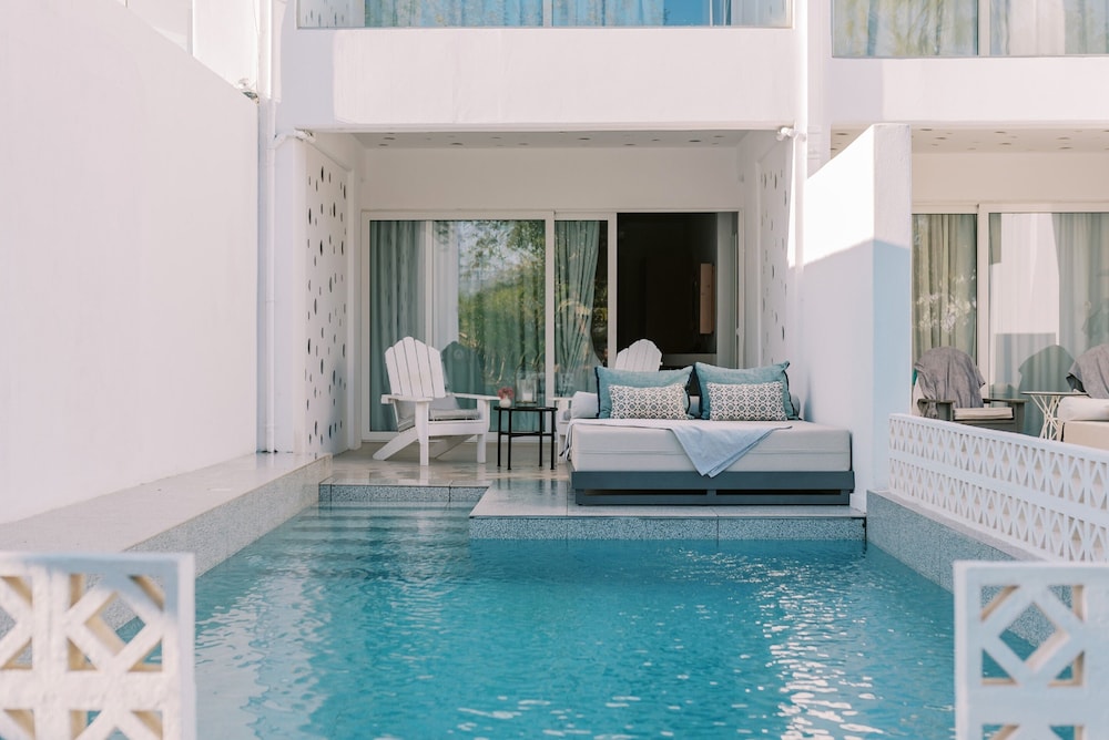 Kouros Exclusive Suites - Adults Only — Swimming pool in Faliraki, South Aegean