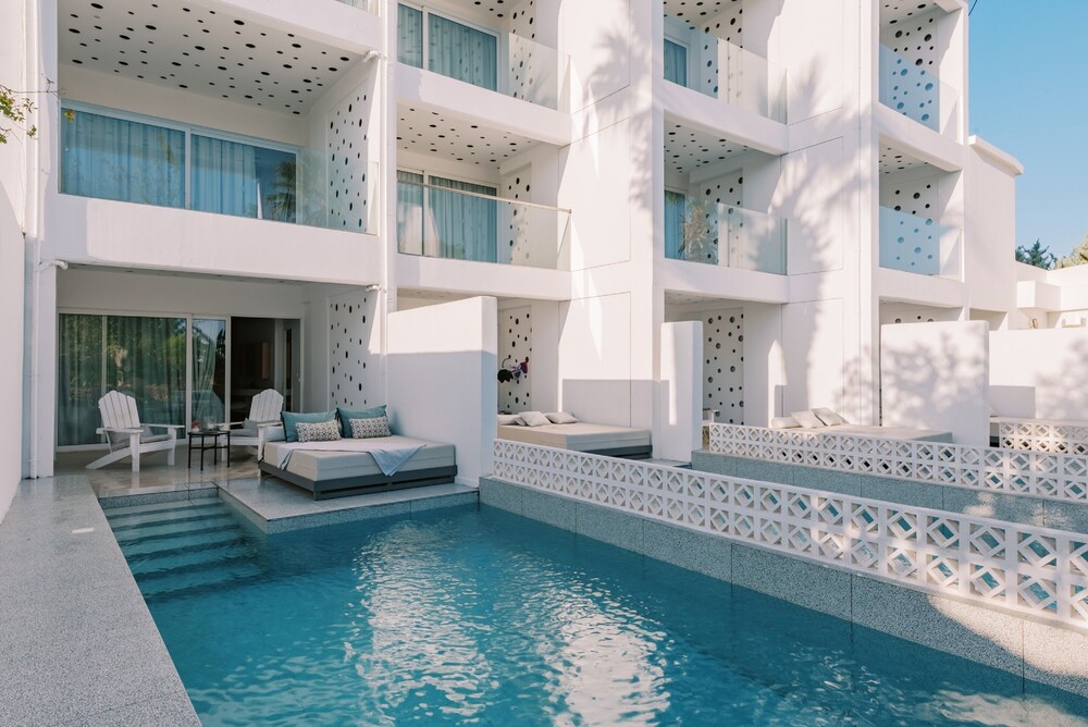 Kouros Exclusive Suites - Adults Only — Swimming pool in Faliraki, South Aegean