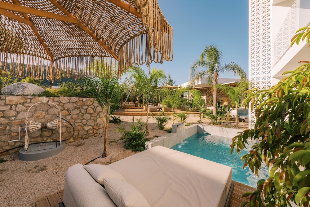 Kouros Exclusive Suites - Adults Only — Swimming pool in Faliraki, South Aegean