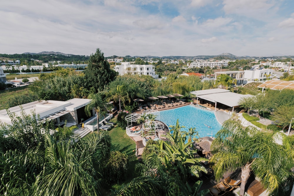 Kouros Exclusive Suites - Adults Only — Swimming pool in Faliraki, South Aegean