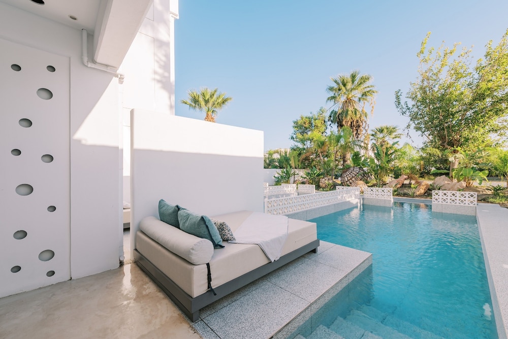 Kouros Exclusive Suites - Adults Only — Swimming pool in Faliraki, South Aegean