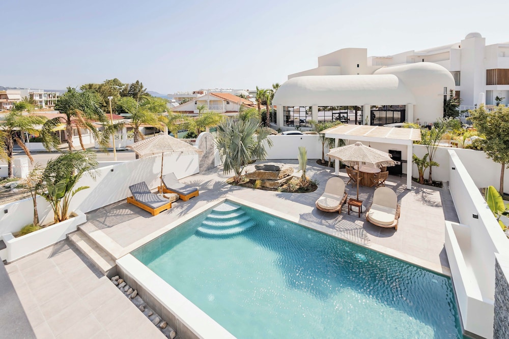 Kouros Exclusive Suites - Adults Only — Swimming pool in Faliraki, South Aegean